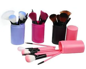 Detailed view of 12pcs makeup brush set in portable purple pink black cylinder case