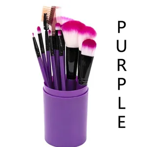 Detail view of a 12-piece purple makeup brush set with a matching cylinder holder.