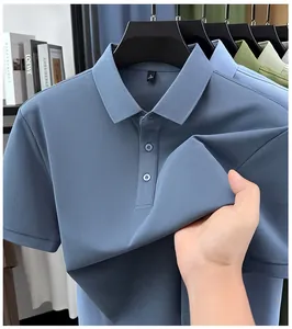 Detail showing the elastic fabric texture of a slim-fit blue polo shirt for men