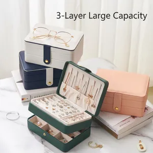 Variety of multi-layer jewelry boxes showcasing internal storage compartments