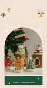 Variety of creative Christmas-themed aroma candles in glass jars for holiday gifts.
