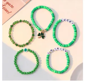 Detailed shot of St. Patrick's Day bracelet set with green clover charms and lucky beads