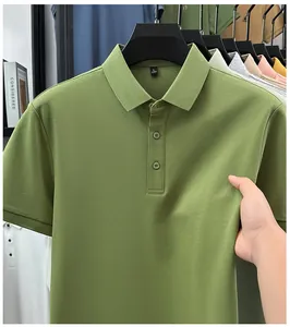 Detailed macro view of a green men's slim fit polo shirt highlighting smooth fabric texture