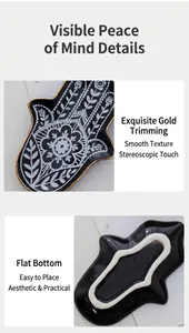 Detailed close-up of Hamsa ceramic jewelry tray featuring gold-rimmed edges and flat base