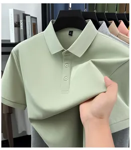 Detailed view of a mint green men's polo shirt showing the premium fabric texture and buttons