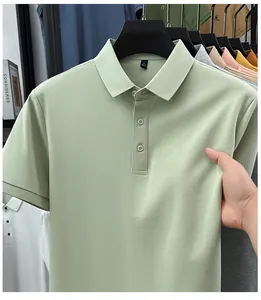 Detailed close-up of a light green men's polo shirt showing soft fabric texture and collar