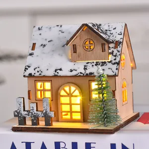 Luminous wooden Christmas house decoration with warm LED lights for desktop festive ornament
