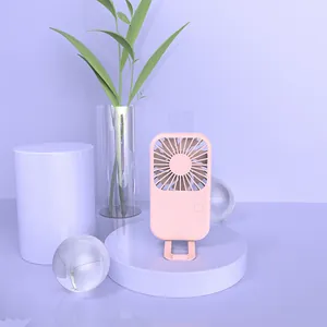 Modern pink portable mini USB handheld pocket fan in a 3D rendered aesthetic scene