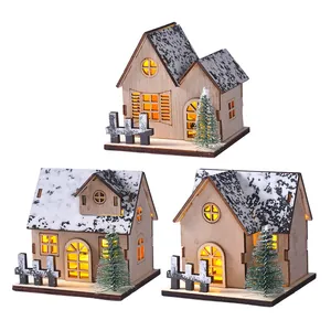 Set of three lighted wooden Christmas village houses with warm LED glow for festive decor