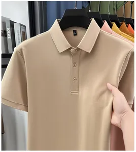 Close-up view of beige men's slim-fit polo shirt showing high-quality fabric texture