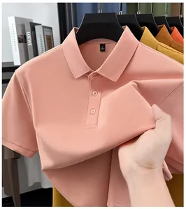 Close-up view of breathable pique fabric on a premium pink men's polo shirt.