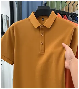 Detailed view of a mustard yellow men's polo shirt showcasing premium fabric texture
