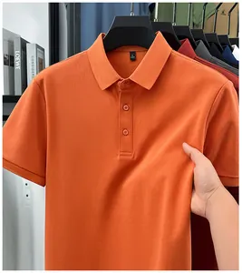Close-up of orange men's polo shirt demonstrating premium fabric stretch and texture