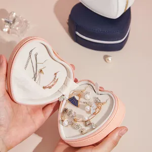 Portable heart-shaped jewelry box organizer for earrings and rings in pink finish
