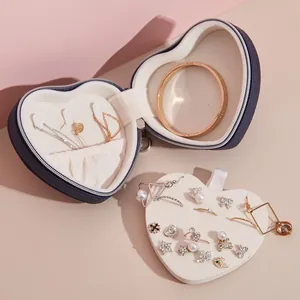 Elegant heart-shaped portable jewelry storage box with a removable stud earring tray