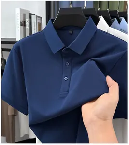 Detailed close-up showing the soft navy blue cotton fabric texture of this premium polo shirt