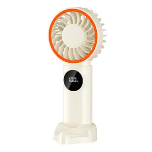 Portable cream white handheld mini fan with digital battery display and orange accent ring