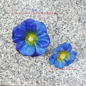 Close-up showing 8cm and 6cm blue artificial magnolia flower heads for DIY decoration