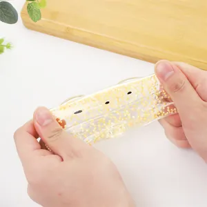 Flexible bear-shaped squeeze toy filled with yellow foam beads for daily stress relief
