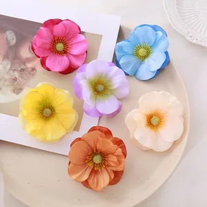Set of colorful artificial magnolia flower heads for home and DIY clothing decoration.