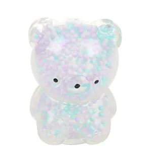 Macro view of a cute bear stress relief toy with purple and blue foam beads