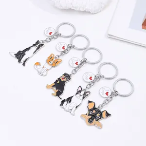 Detailed view of colorful zinc alloy cartoon dog keychains with 'I Love Dogs' tags