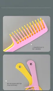 Detail view of the wide-tooth comb showing U-shaped slot and hanging hole design.