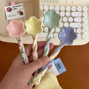 Set of colorful star-shaped ceramic stirring spoons for dessert, coffee and tea.