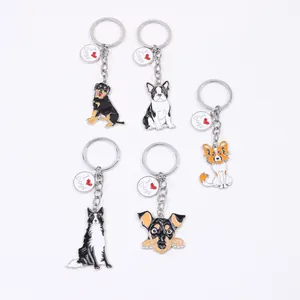 Collection of five enamel dog keychains in zinc alloy featuring different dog breeds