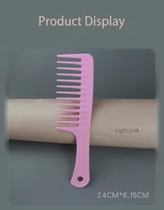 Detail of a wide-tooth pink detangling comb for long hair with size 24cm by 6.15cm
