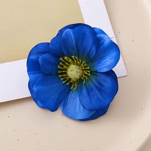 Detailed close-up view of a vibrant blue artificial magnolia flower head for DIY home decor