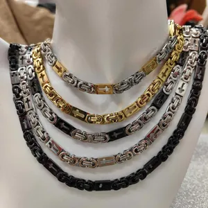 Detailed view of men's stainless steel Byzantine chains with cross motifs in various colors.