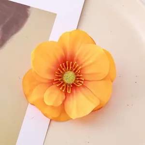 Close-up view of a vibrant yellow artificial magnolia flower head for home decor