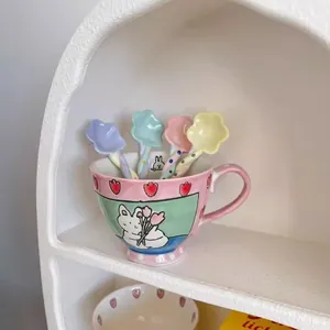 Cute star-shaped ceramic stirring spoons in pastel colors with matching rabbit cup