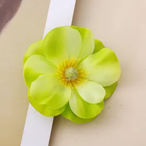 Close-up macro view of a high-quality lime green artificial magnolia flower head