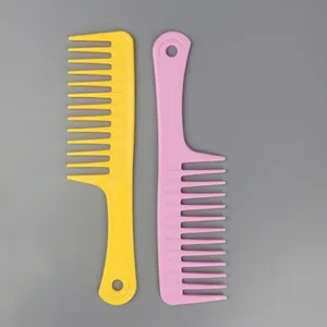 Coppia di pettini professionali a denti larghi per capelli ricci nei colori giallo e rosa vivace