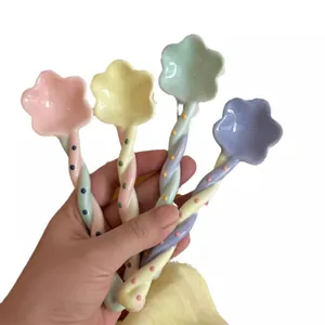 Cute pastel ceramic spoons with flower-shaped heads and twisted handles set of four