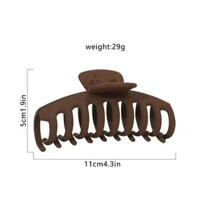 Detailed measurements of a large matte brown hair claw clip, 11cm length.