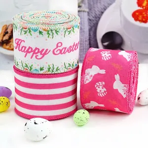 Close-up of Easter wired ribbons with Happy Easter text and rabbit patterns