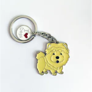 Close-up of a cartoon chow chow dog keychain featuring a cute 'I Love Dogs' charm.