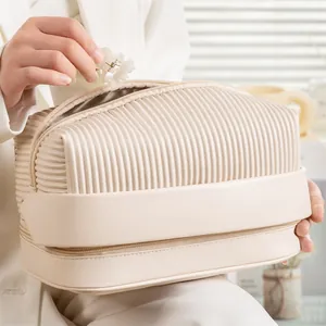 Large capacity cream pleated makeup bag made of waterproof PU for travel storage