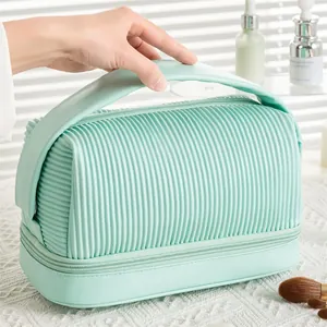 Mint green pleated PU leather cosmetic bag with double layer storage and handle