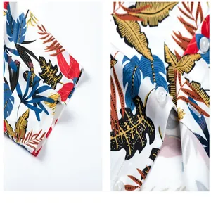 Detailed macro shot showing tropical leaf print and white buttons of Hawaiian beach shirt.