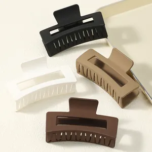 Large matte square hair claw clips set in neutral colors for thick hair styling