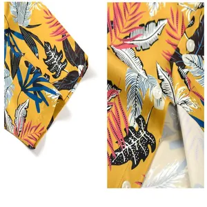 Close-up detail of colorful tropical leaf pattern on yellow ice silk Hawaiian shirt