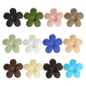 Collection of 12 matte flower hair claw clips in various pastel and neutral shades