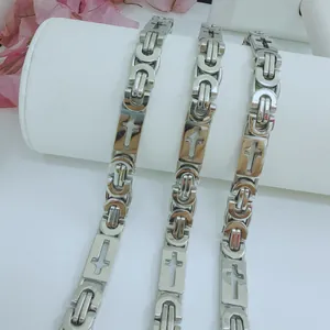 Detailed view of men's stainless steel Byzantine chain with cross cutout links