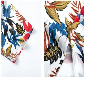 Detailed macro view of tropical leaf print and white buttons on cooling Hawaiian shirt