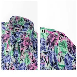 Close-up of tropical leaf print and collar detail on a men's Hawaiian ice silk shirt