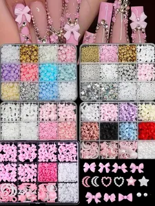 Detailed macro of 12-grid nail art decoration kit with mixed pearls, bows and rhinestones